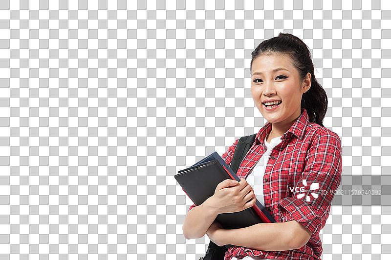 棚拍年轻女人抱着书本图片素材