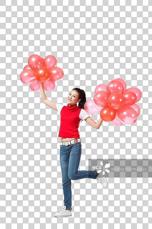 棚拍年轻女人举着红色气球图片素材