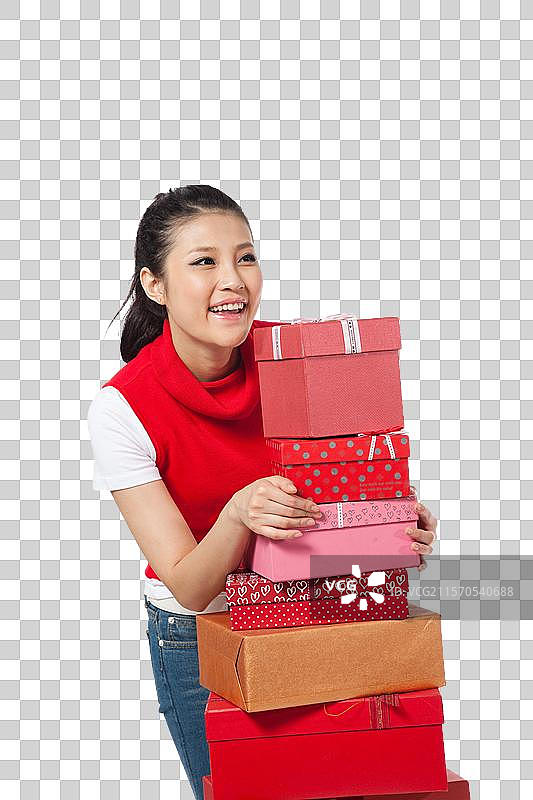 棚拍年轻女人和礼物盒图片素材