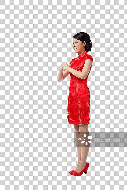棚拍节日身穿红色旗袍的年轻女人图片素材