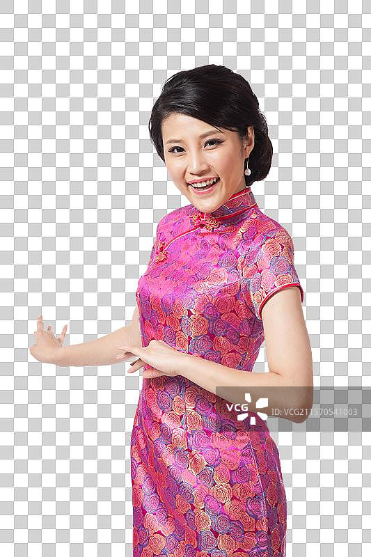 棚拍穿旗袍的年轻女人图片素材