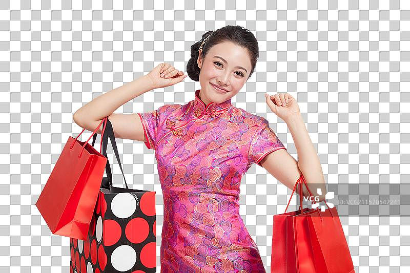 棚拍身穿中国传统服装的年轻女人购物图片素材