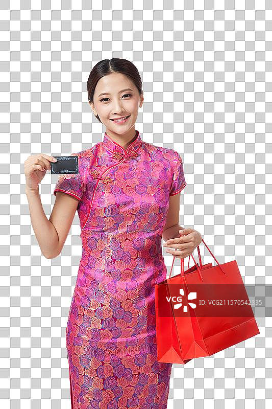 棚拍身穿中国传统服装的年轻女人购物图片素材