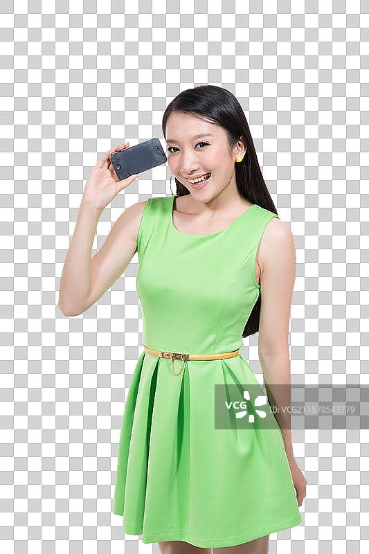 棚拍休闲装年轻女人展示手机图片素材