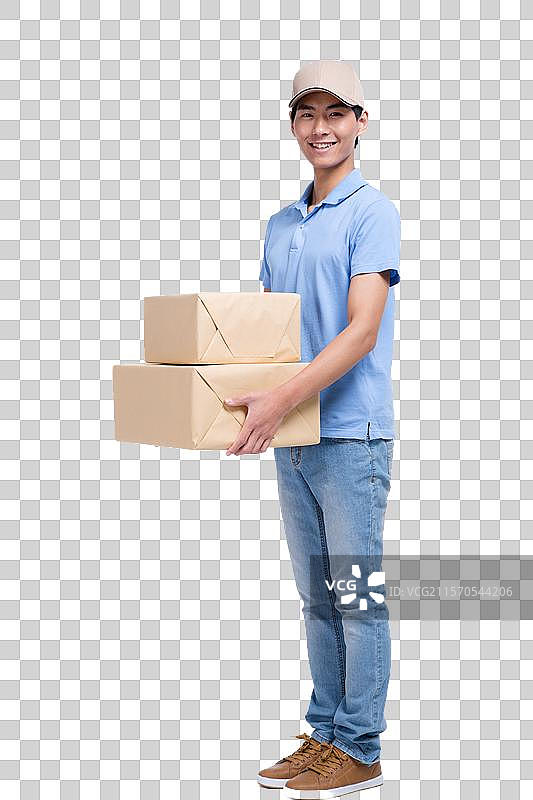 棚拍工作装年轻男快递员图片素材
