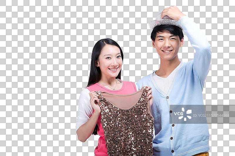 棚拍年轻情侣试穿购物商品图片素材