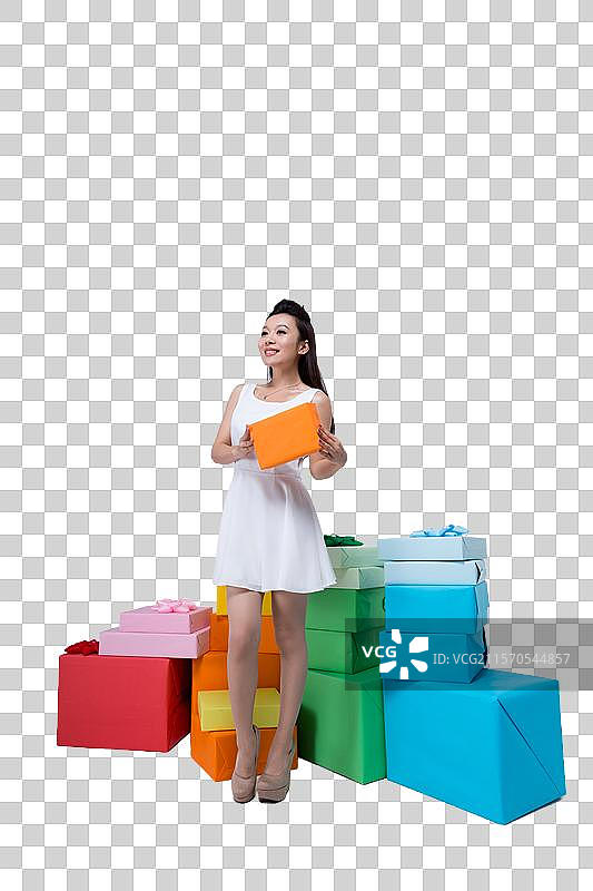 棚拍时尚年轻女人和彩色礼物盒图片素材