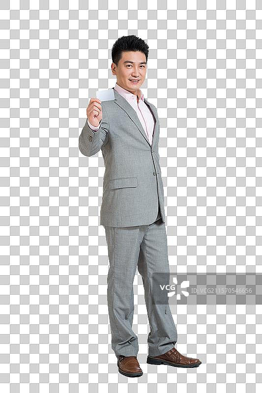 棚拍中年商务男士展示银行卡图片素材