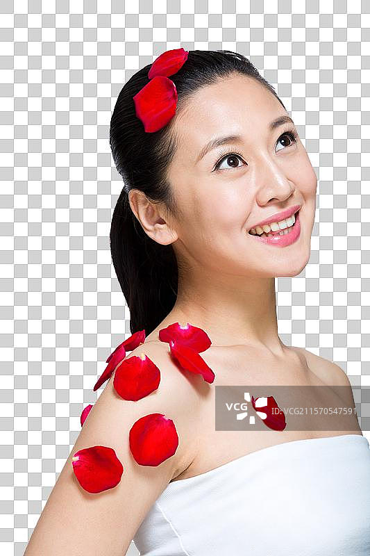棚拍年轻女人和花瓣图片素材