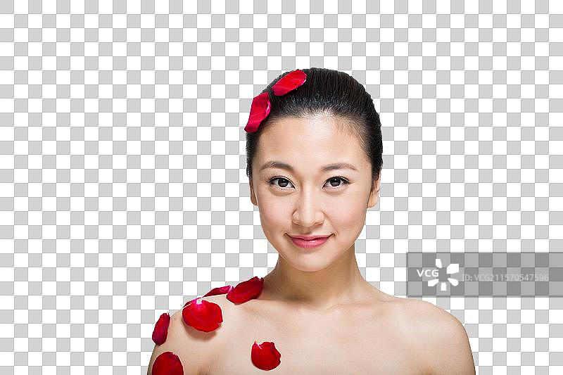 棚拍年轻女人和花瓣图片素材