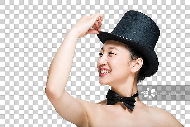 棚拍戴礼帽的年轻女人图片素材