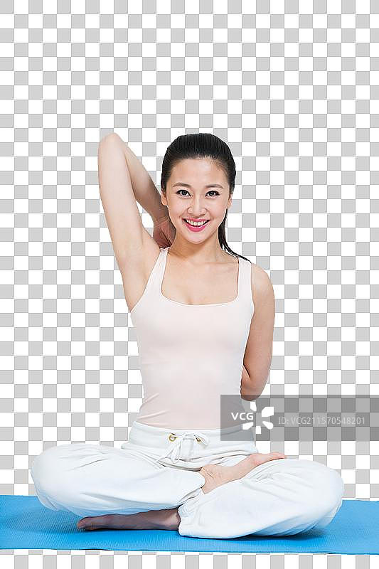 棚拍年轻女人做瑜伽图片素材