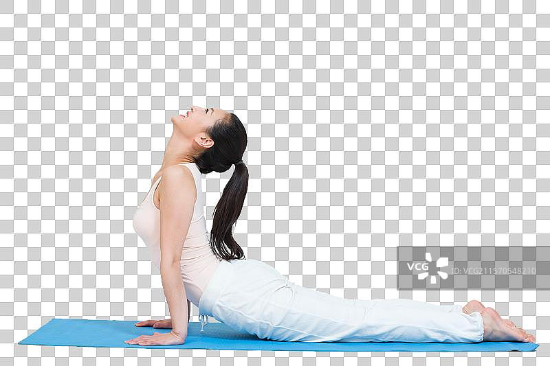 棚拍年轻女人做瑜伽图片素材