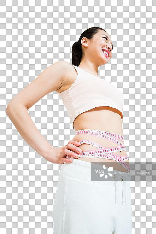 棚拍年轻女人腰部减肥塑型图片素材