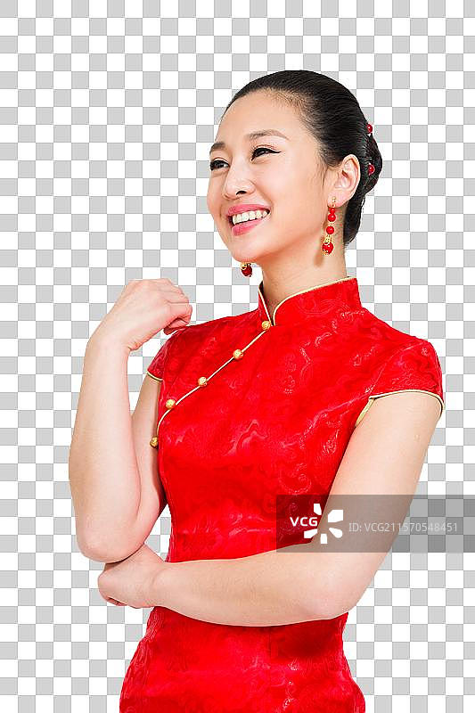 棚拍穿红色旗袍的年轻女人图片素材