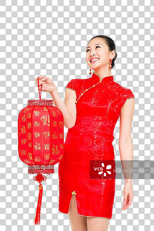 棚拍穿红色旗袍的年轻女人提着灯笼图片素材