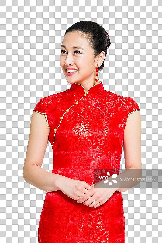 棚拍穿红色旗袍的年轻女人图片素材