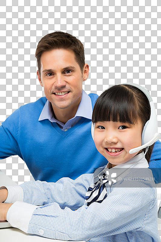 外教男老师辅导小学生学习图片素材