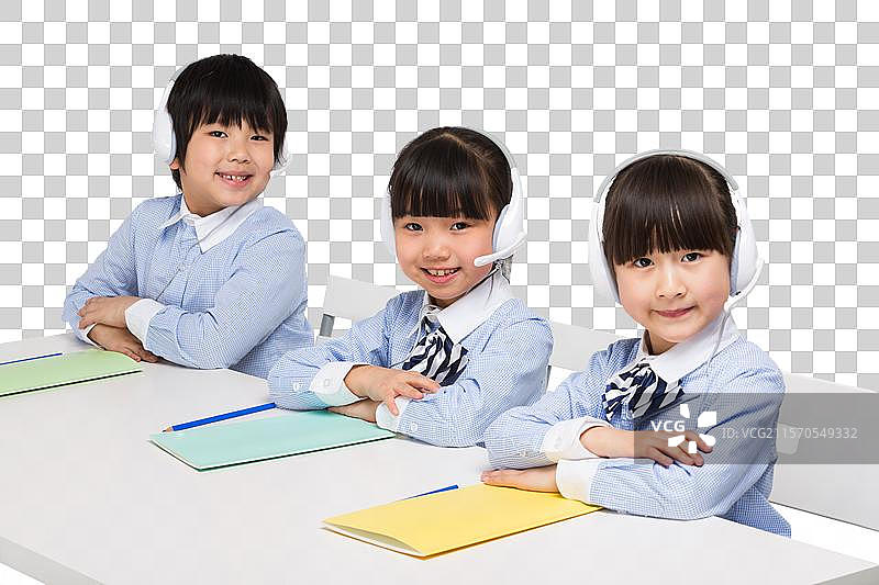 小学生们戴耳麦上课图片素材