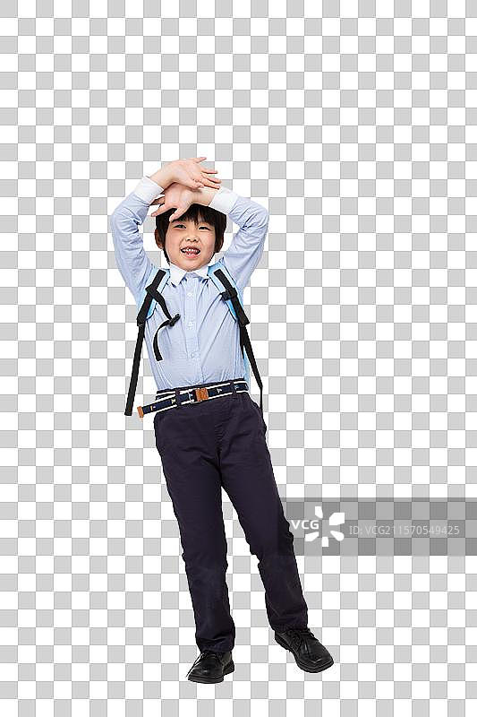小学生背着书包图片素材