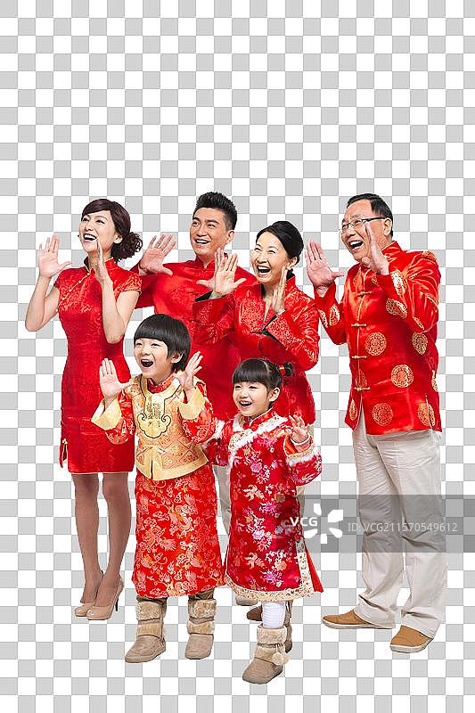 棚拍中国新年快乐的唐装家庭图片素材
