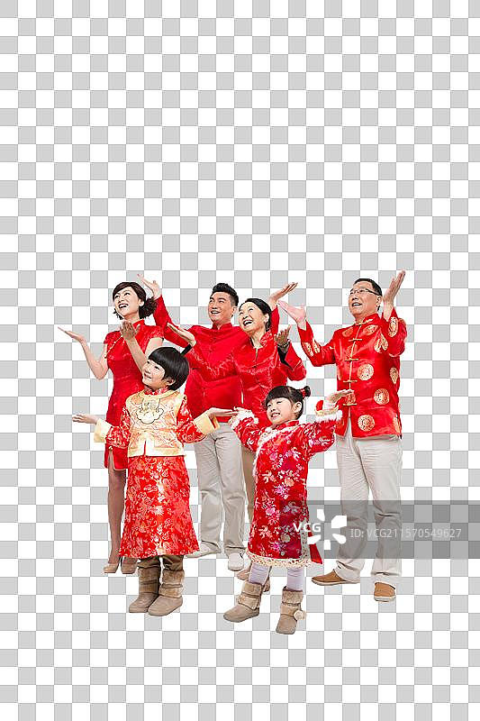 棚拍中国新年快乐的唐装家庭图片素材