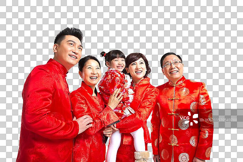 棚拍中国新年快乐的唐装家庭图片素材