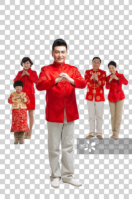 棚拍中国新年快乐的唐装家庭图片素材