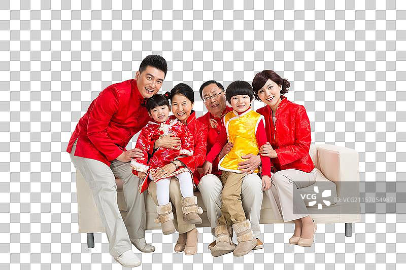 棚拍中国新年快乐的唐装家庭图片素材