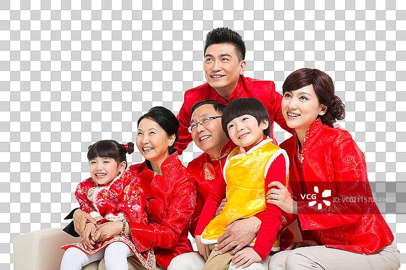 棚拍中国新年快乐的唐装家庭图片素材
