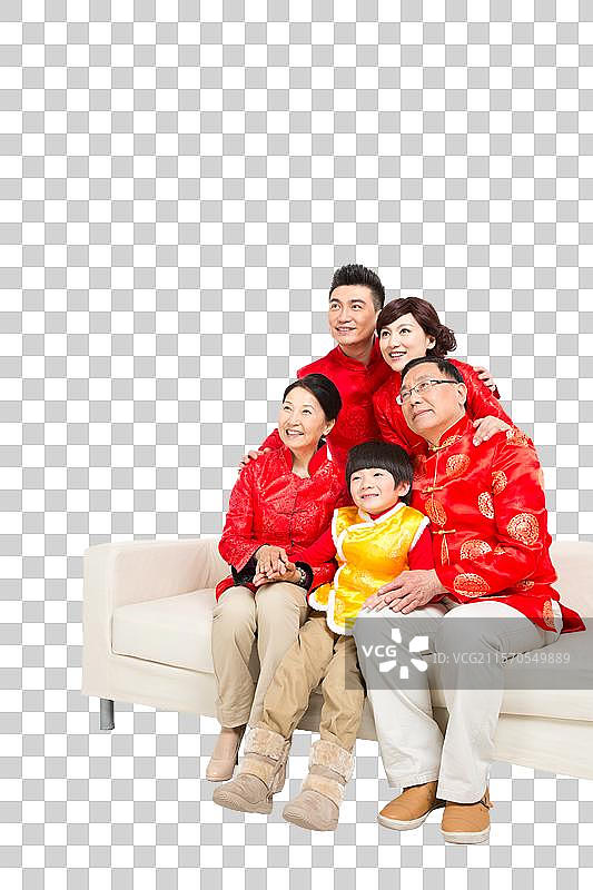 棚拍中国新年快乐的唐装家庭图片素材