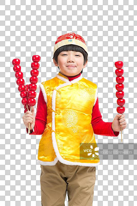 棚拍中国新年唐装儿童拿糖葫芦图片素材