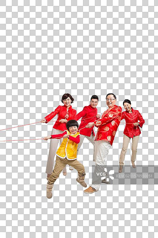 棚拍中国新年快乐的唐装家庭图片素材