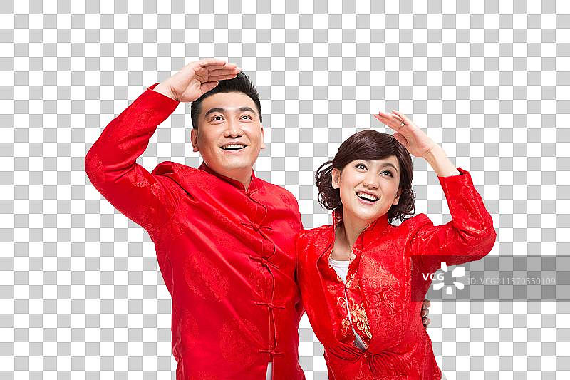 棚拍中国新年快乐的唐装夫妻图片素材