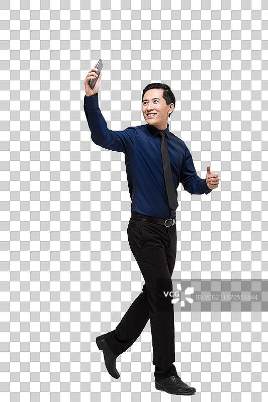 棚拍商务男士使用智能手机图片素材