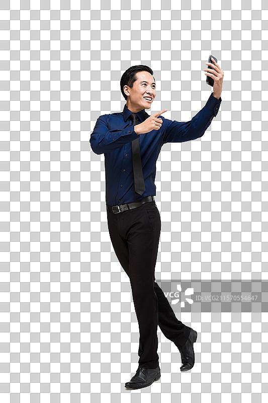 棚拍商务男士使用智能手机图片素材