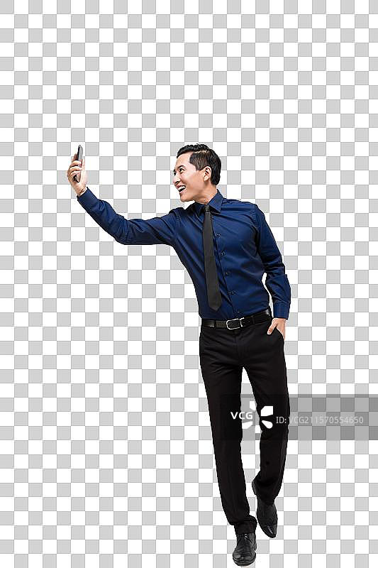 棚拍商务男士使用智能手机图片素材