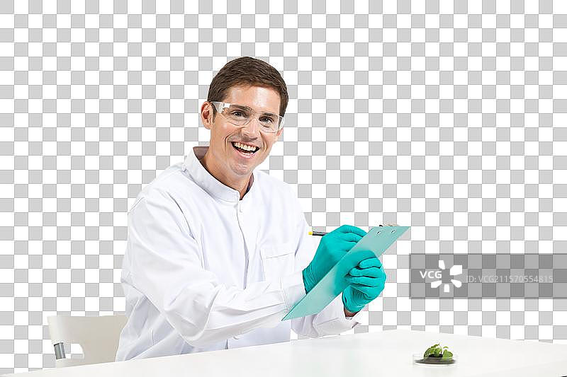 外籍男科学家在实验室研究植物图片素材