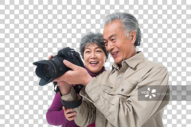 老年夫妇旅游拍照图片素材