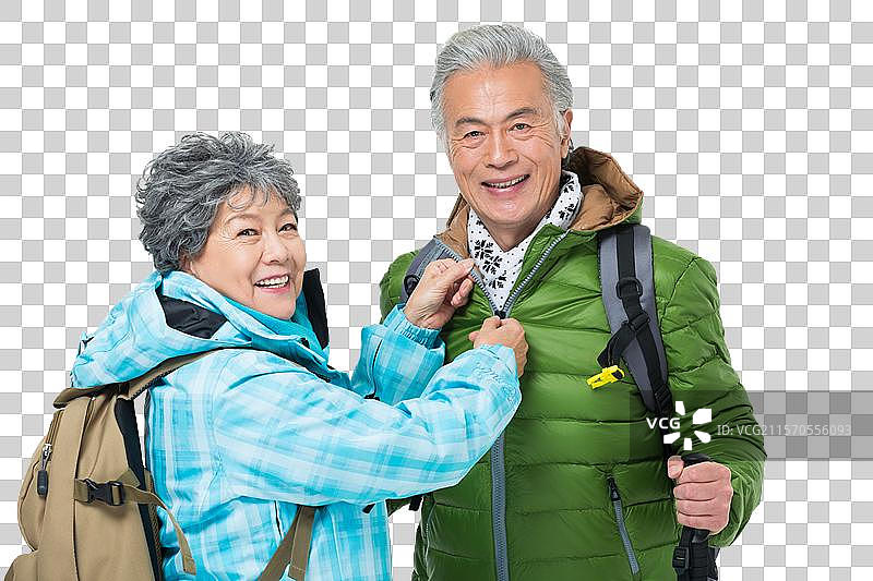 老年夫妇冬季登山旅行图片素材