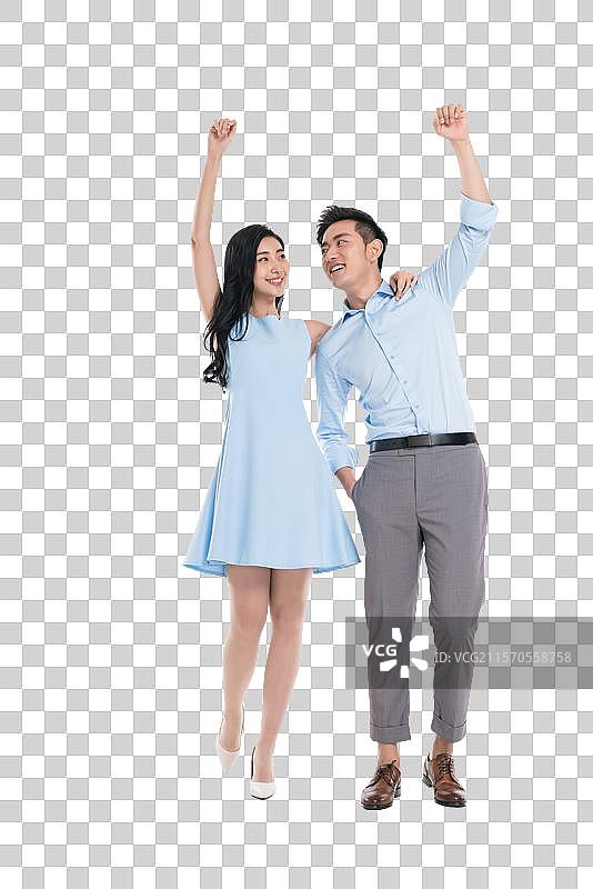 年轻情侣欢呼雀跃图片素材