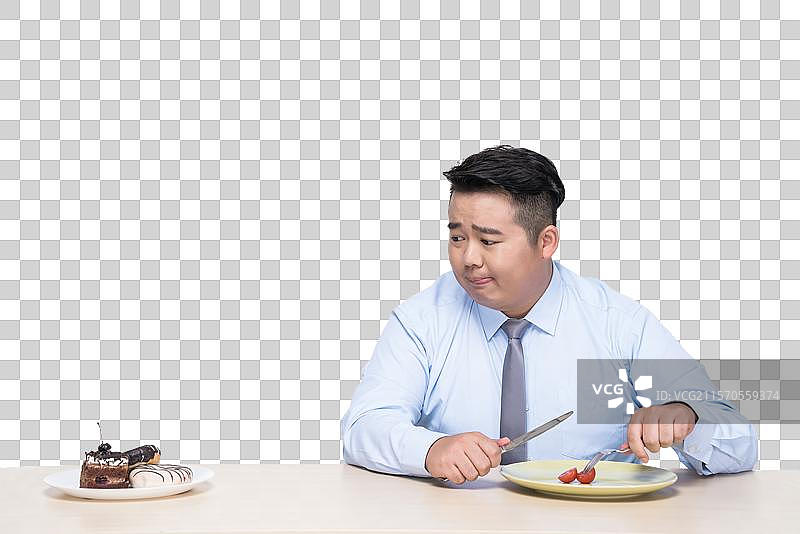 胖子吃蔬菜图片素材