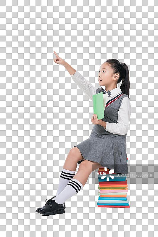 快乐的小学生和书图片素材