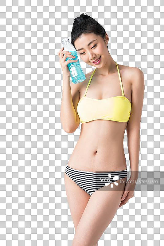 穿着比基尼的美女喝饮料图片素材