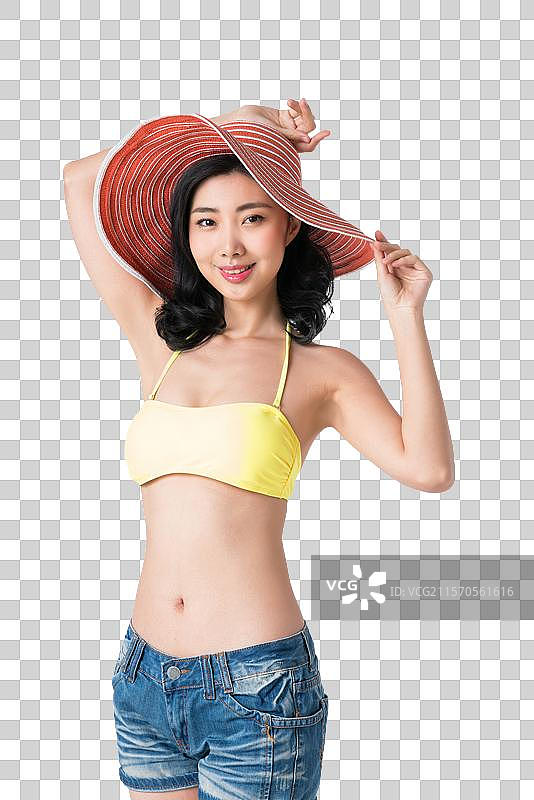 戴着遮阳帽穿着比基尼的美女图片素材