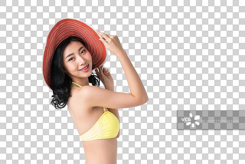 戴着遮阳帽穿着比基尼的美女图片素材