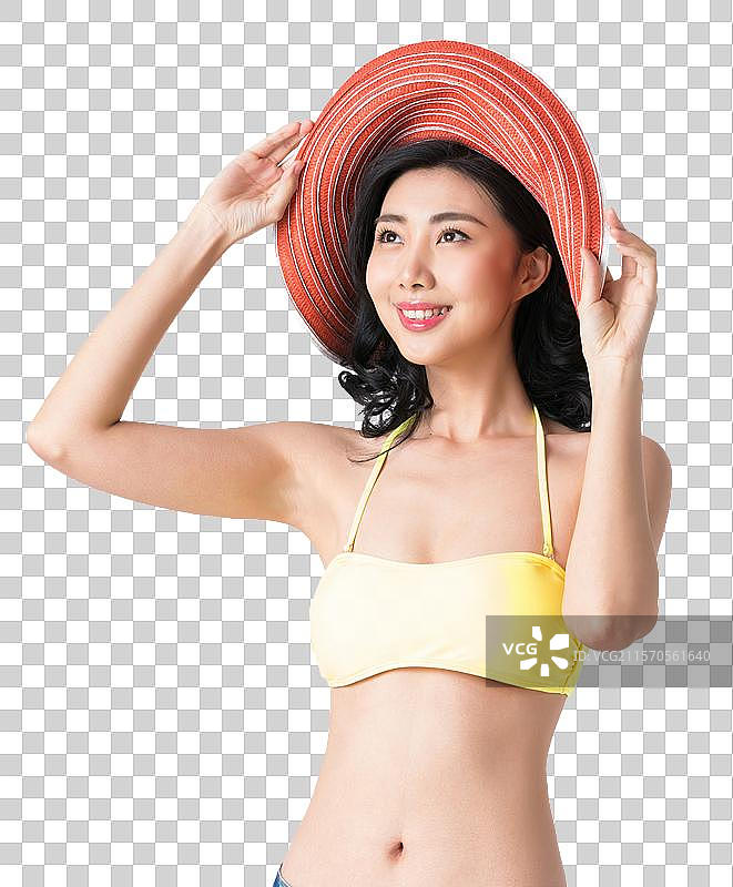戴着遮阳帽穿着比基尼的美女图片素材