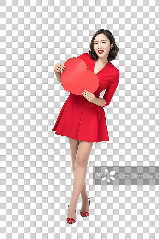 身穿红色连衣裙的年轻女子图片素材
