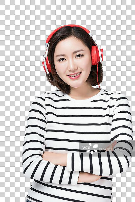 年轻女子戴着耳机图片素材