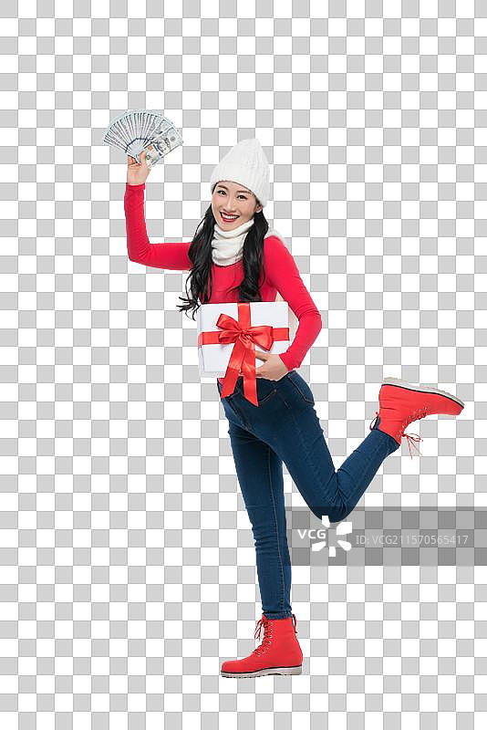 年轻女子拿着礼物和钞票图片素材